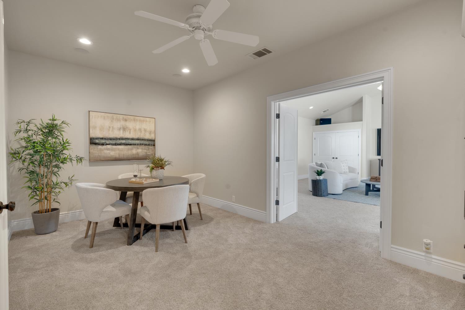 2905 Virginiatown Road Lincoln, CA 95648 - Photo 32 of 86 Carpeted room with recessed lighting and a ceiling fan, featuring a wide doorway opening to an additional room