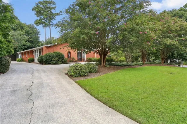 a view of backyard with green space