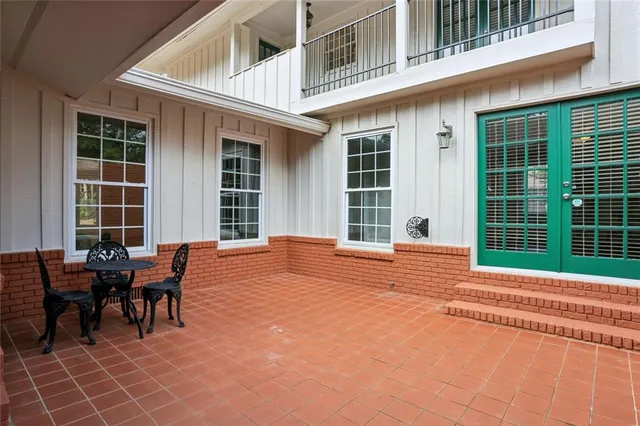 a backyard of a house with seating space