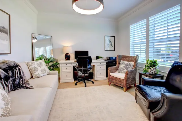 a bathroom with a sink mirror and toilet