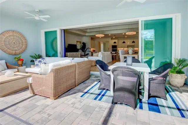 a view of a living room and dining room