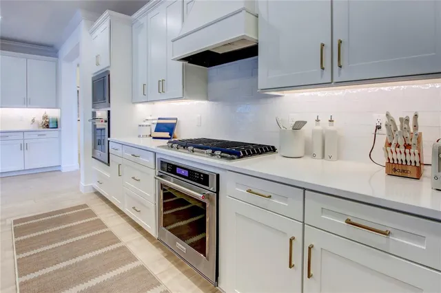 a hallway with view of wooden floor