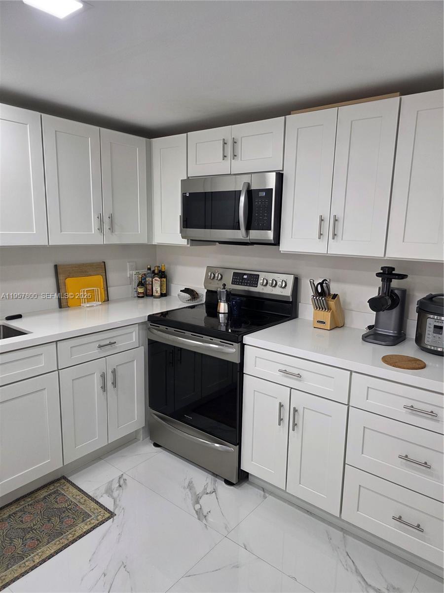 6904 Southwest 114th Place, Unit C58 Miami, FL 33173 - Photo 21 of 27 modern cabinetry