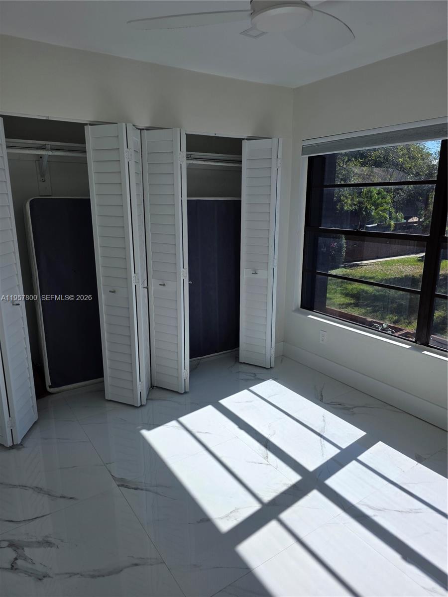 6904 Southwest 114th Place, Unit C58 Miami, FL 33173 - Photo 22 of 27 2nd bedroom - lots of light