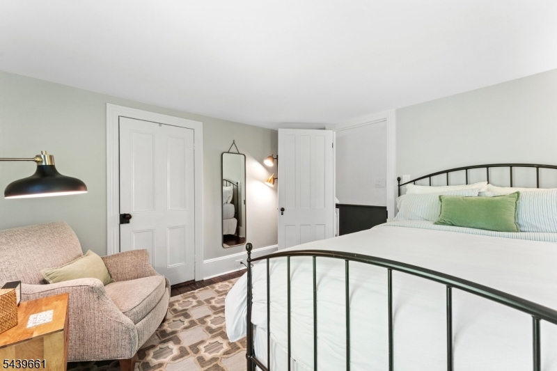 29 Bedens Brook Road Skillman, NJ 08558 - Photo 36 of 50 a bedroom with a bed and wooden floor