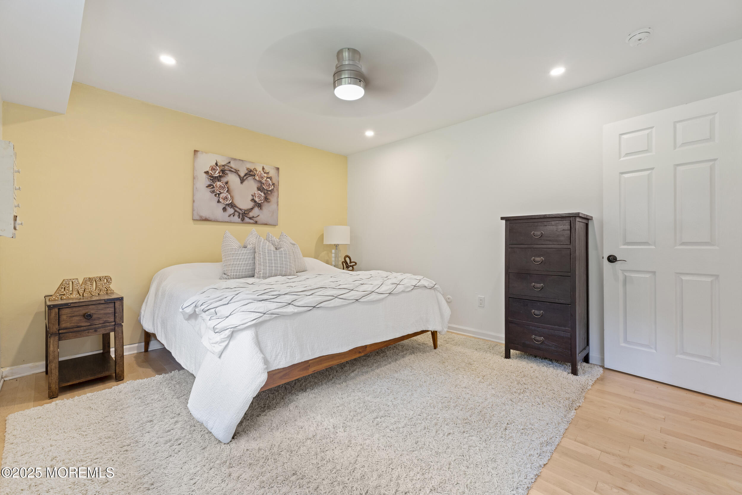 200 Portland Road, Unit B22 Highlands, NJ 07732 - Photo 16 of 35 a bedroom with a bed and a walk in closet