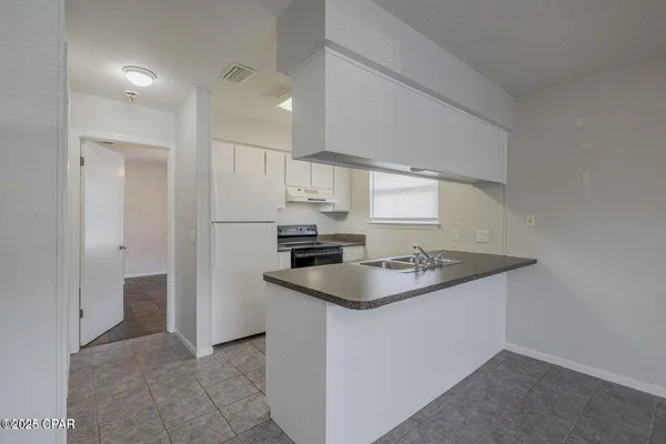 $1,450 | 7813 North Lagoon Drive, Unit 4H, Panama City Beach, FL 32408