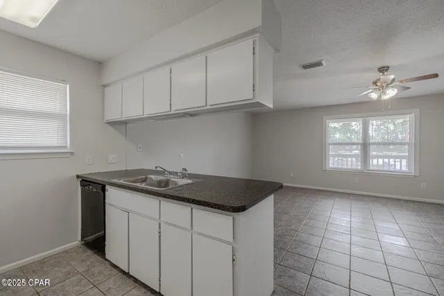 $1,500 | 7813 North Lagoon Drive, Unit 4H, Panama City Beach, FL 32408