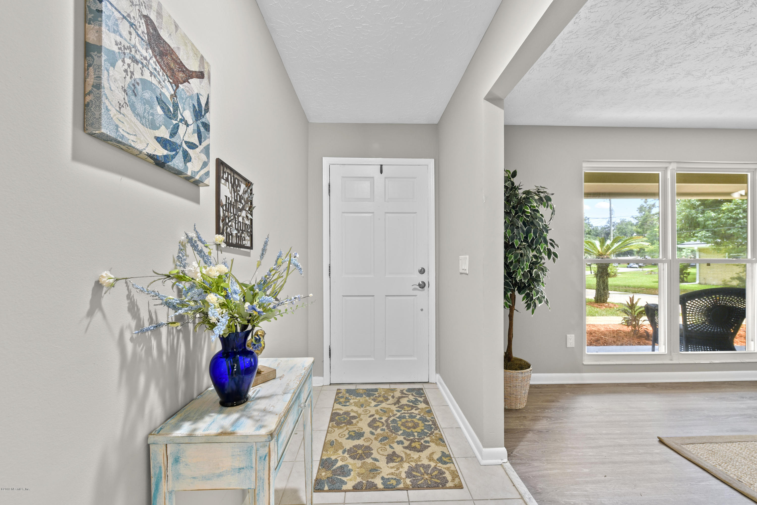 1276 Arbor Circle Orange Park, FL 32073 - Photo 3 of 23 a view of entryway with paintings on the wall