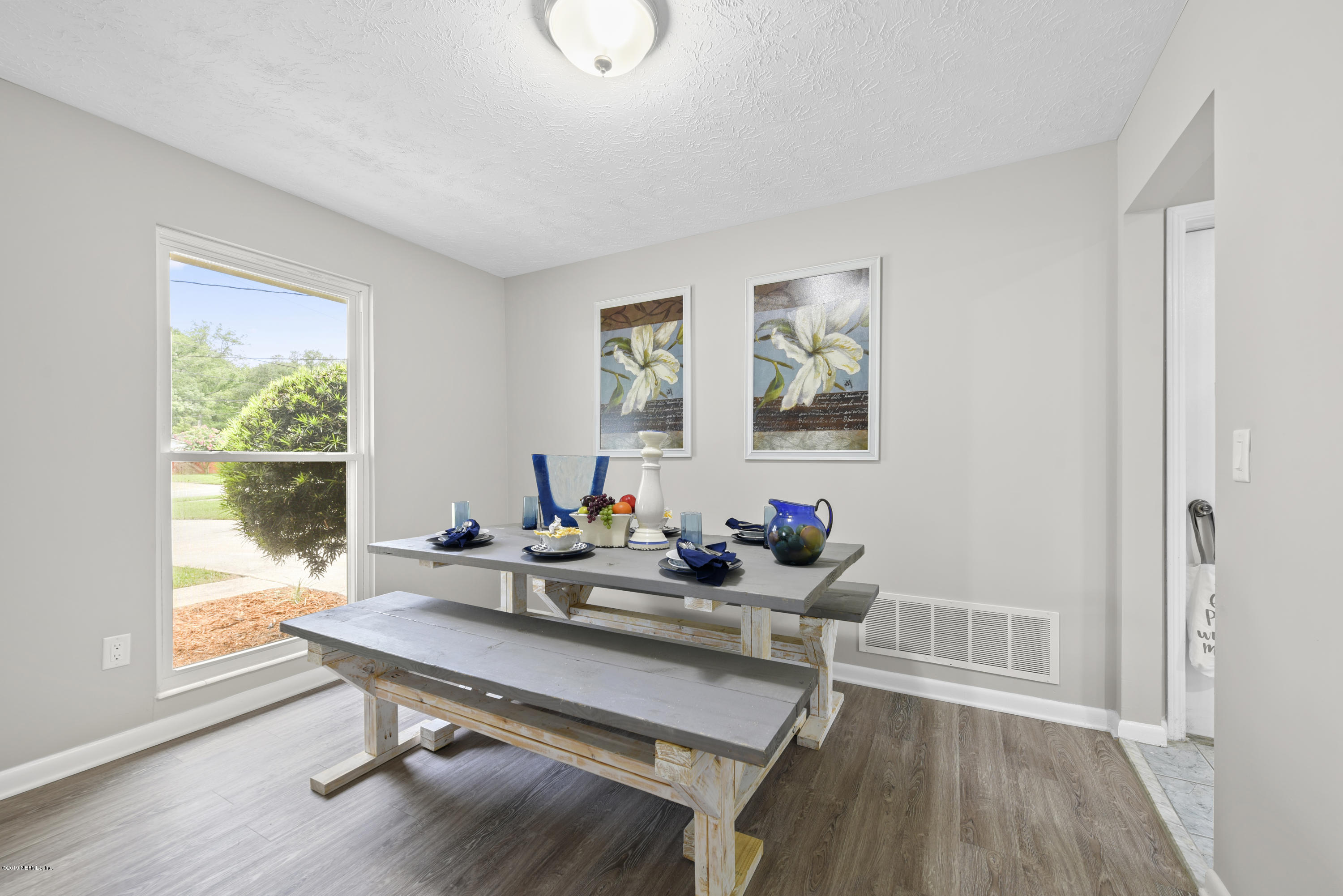 1276 Arbor Circle Orange Park, FL 32073 - Photo 7 of 23 a living room with furniture and wooden floor