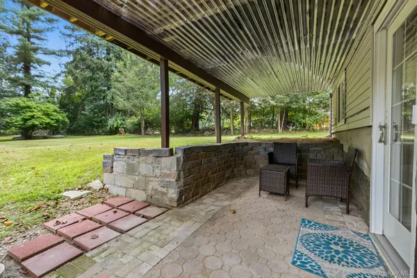 a view of a garden with deck