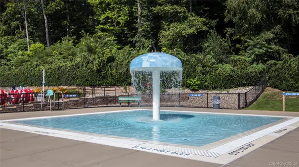 a view of a backyard with pathway