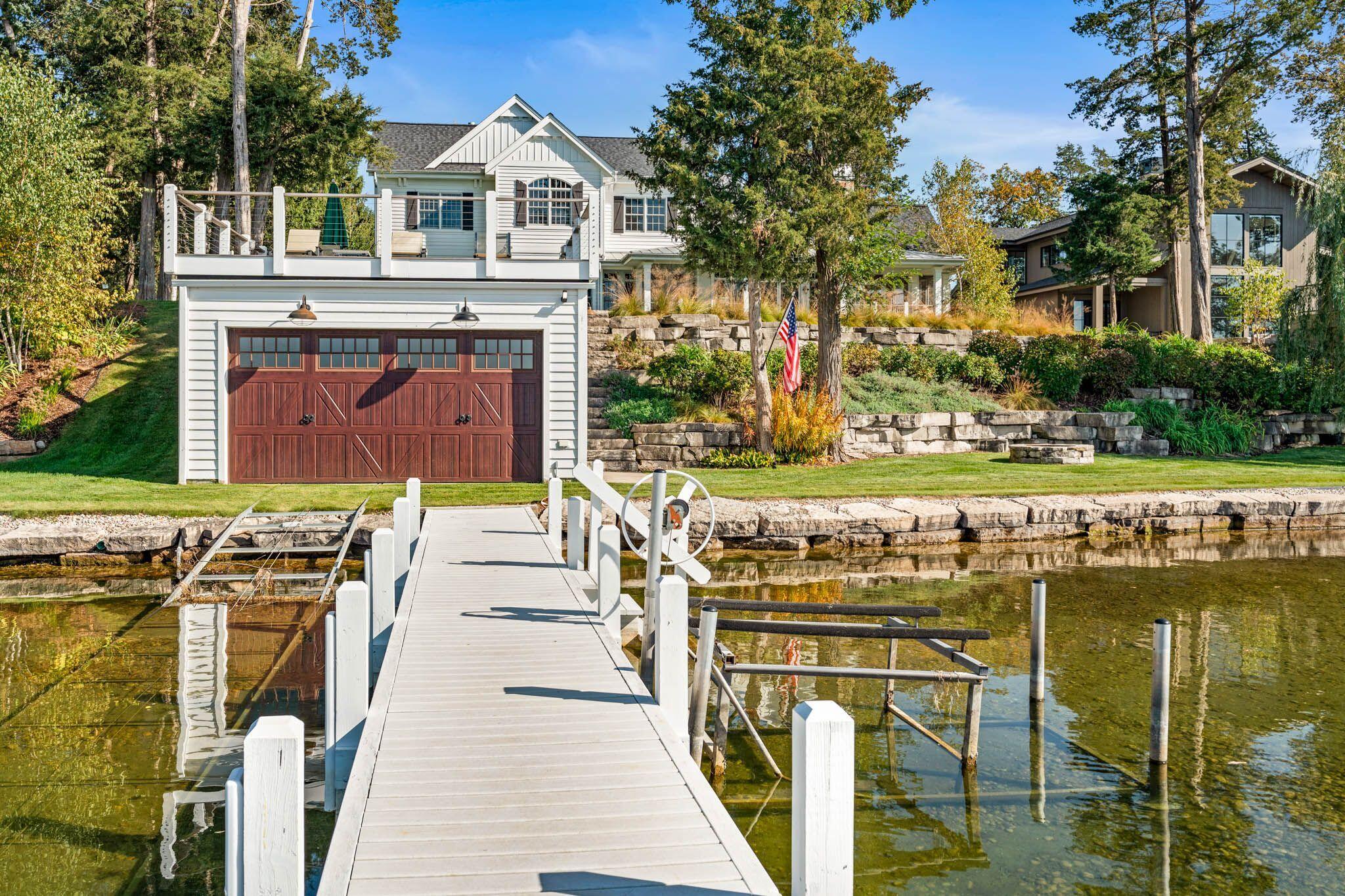 3005 North Silver Cedar Road Summit, WI 53066 - Photo 27 of 28 Heated boathouse with track system, dehumidifier, WiFi, and Sonos