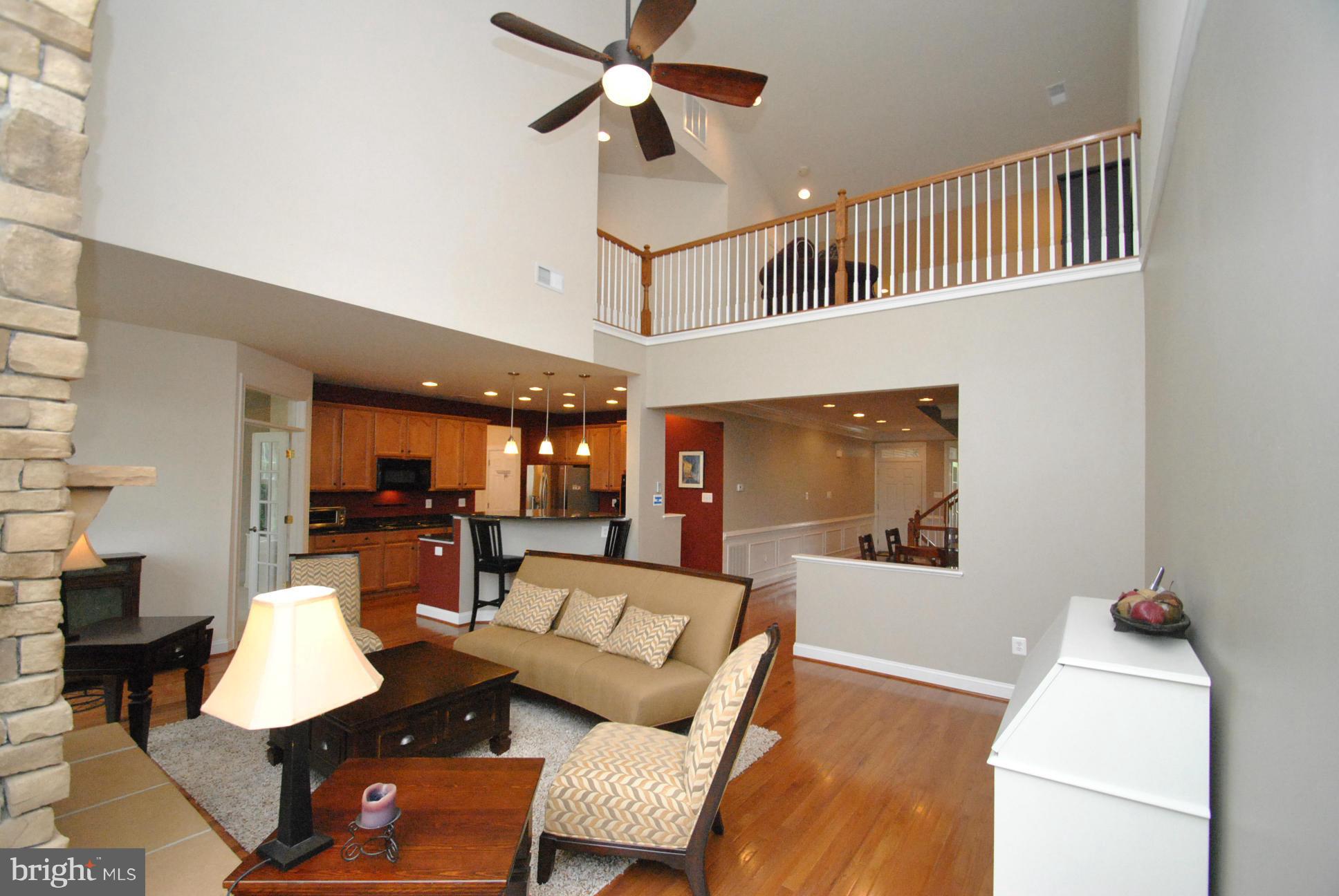 5121 Bright Owl Road Perry Hall, MD 21128 - Photo 8 of 30 2 STORY OPEN FAMILY ROOM W/STONE HEARTH FIREPLACE