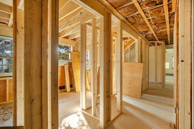 a view of an empty room with closet