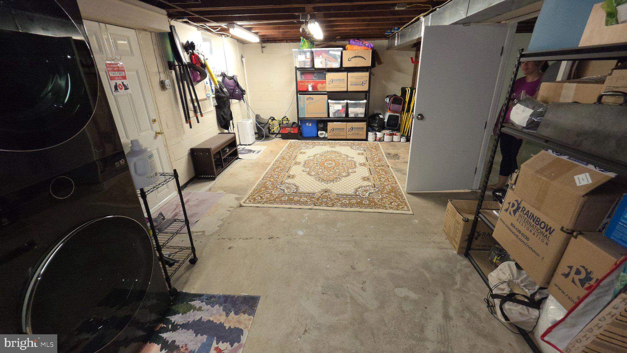 8418 Geneva Road Pasadena, MD 21122 - Photo 35 of 53 Spacious basement with organized storage.