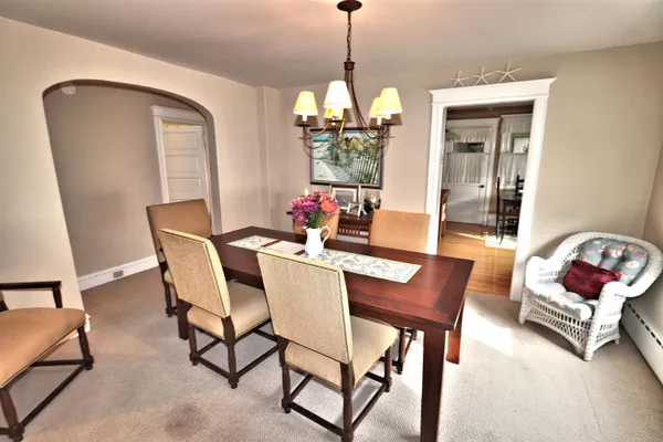 a kitchen with stainless steel appliances granite countertop a refrigerator a stove top oven a sink and dishwasher