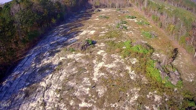 a view of a yard with an outdoor space