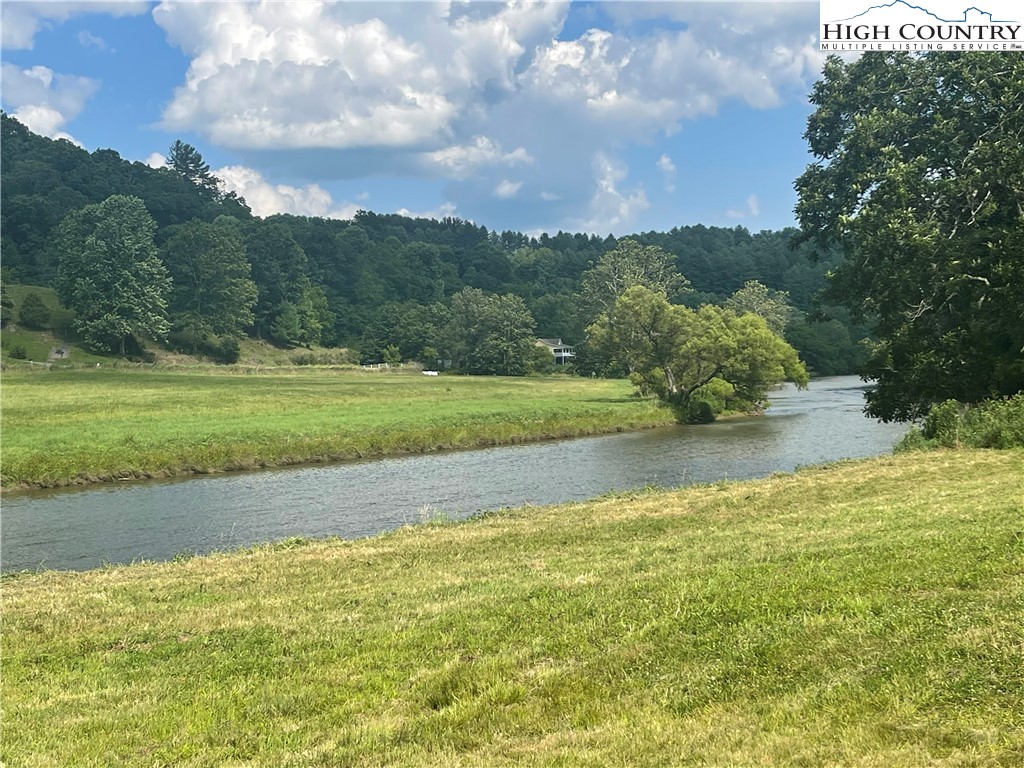 878 Ballou Farm Road Crumpler, NC 28617 - Photo 11 of 45 a view of a golf course with an ocean