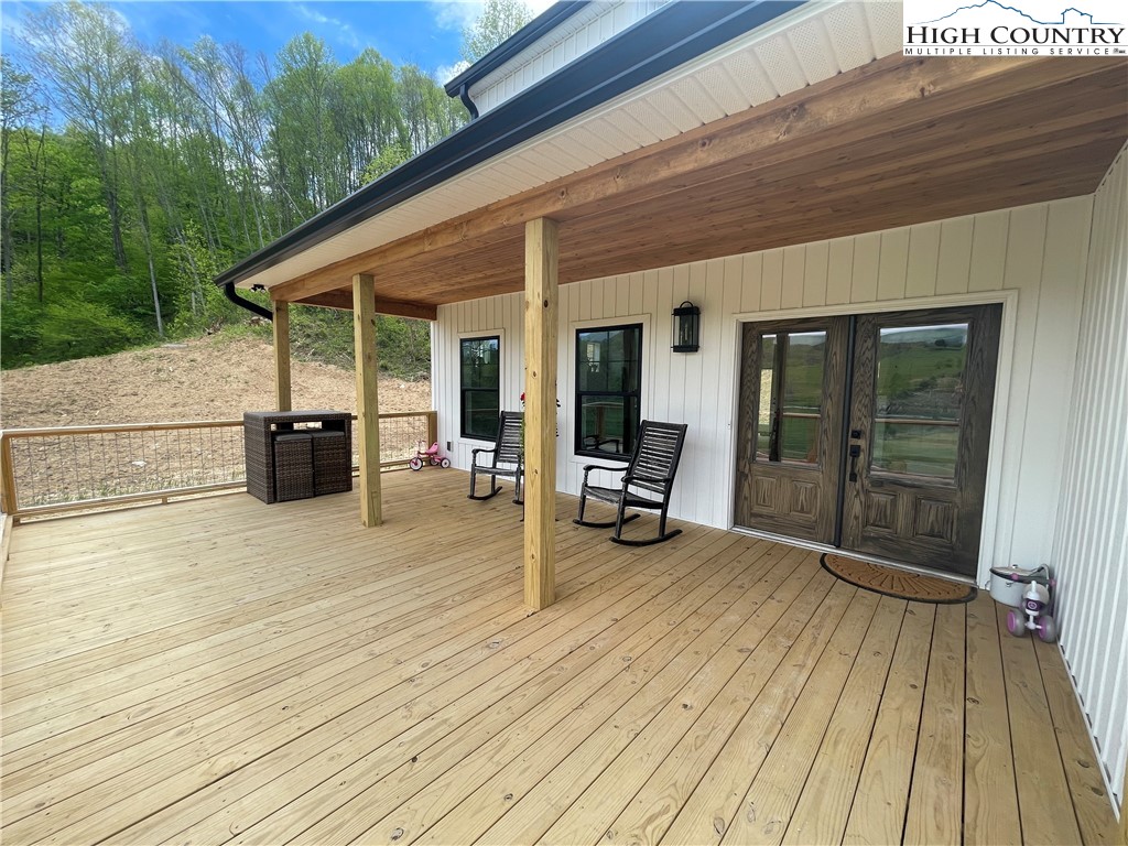 878 Ballou Farm Road Crumpler, NC 28617 - Photo 14 of 45 a view of a terrace with seating space