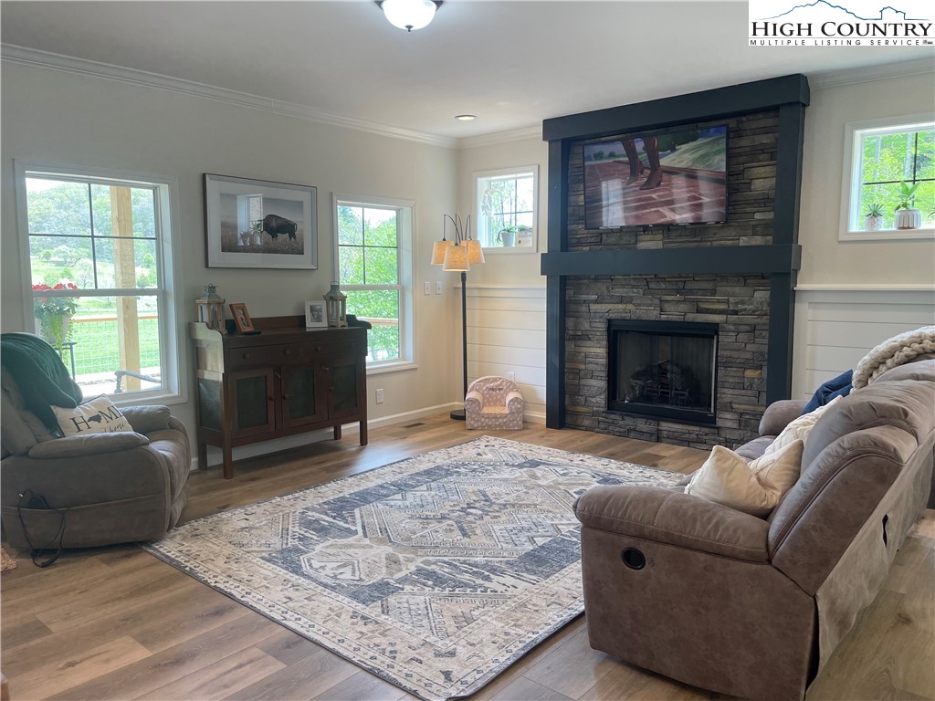 878 Ballou Farm Road Crumpler, NC 28617 - Photo 16 of 45 a living room with furniture and a fireplace