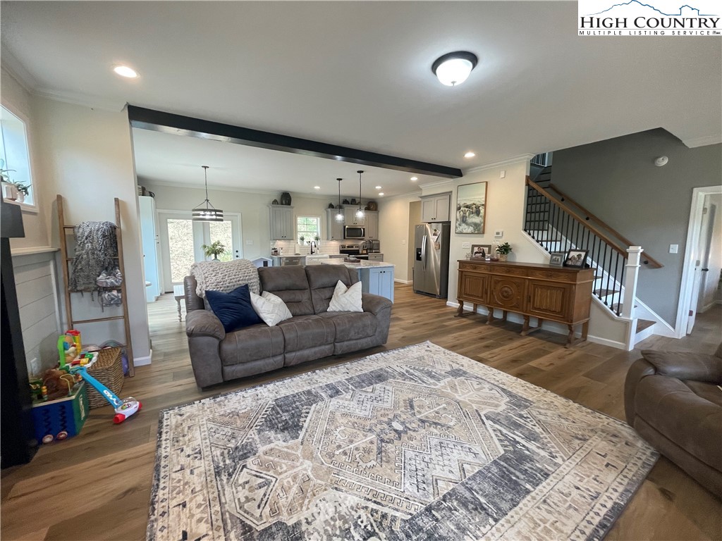 878 Ballou Farm Road Crumpler, NC 28617 - Photo 18 of 45 a living room with furniture and a flat screen tv