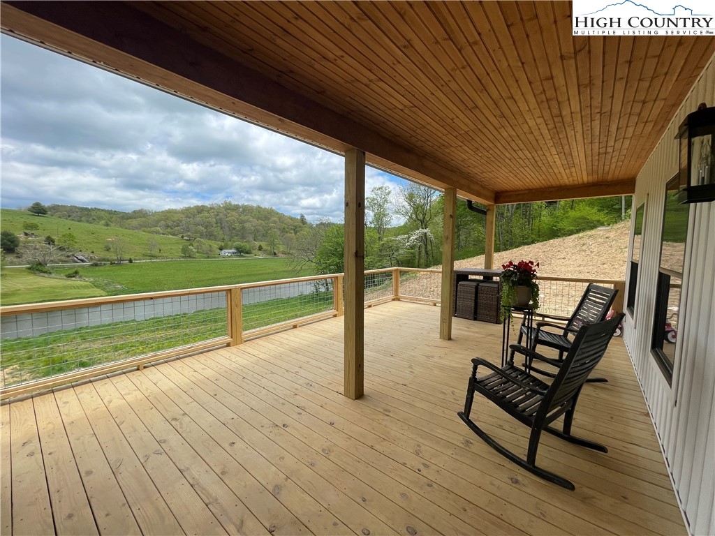 878 Ballou Farm Road Crumpler, NC 28617 - Photo 2 of 45 a view of outdoor space with seating yard