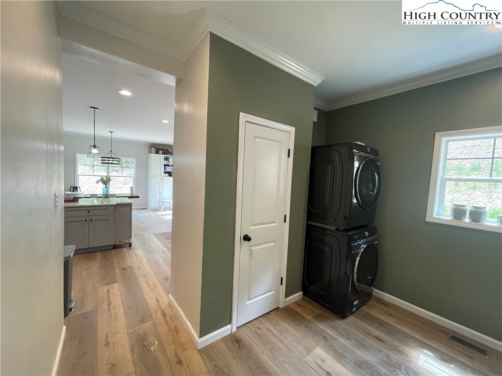 878 Ballou Farm Road Crumpler, NC 28617 - Photo 35 of 45 a view of a kitchen with refrigerator and wooden floor