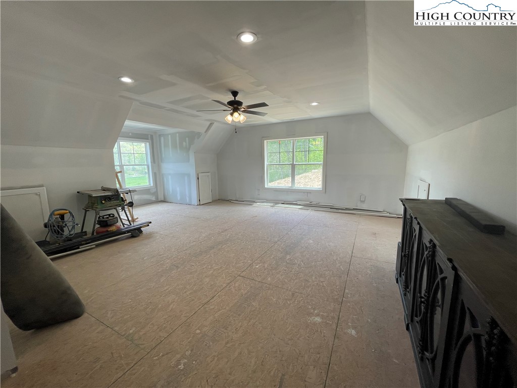 878 Ballou Farm Road Crumpler, NC 28617 - Photo 43 of 45 a view of a livingroom with furniture and a ceiling fan