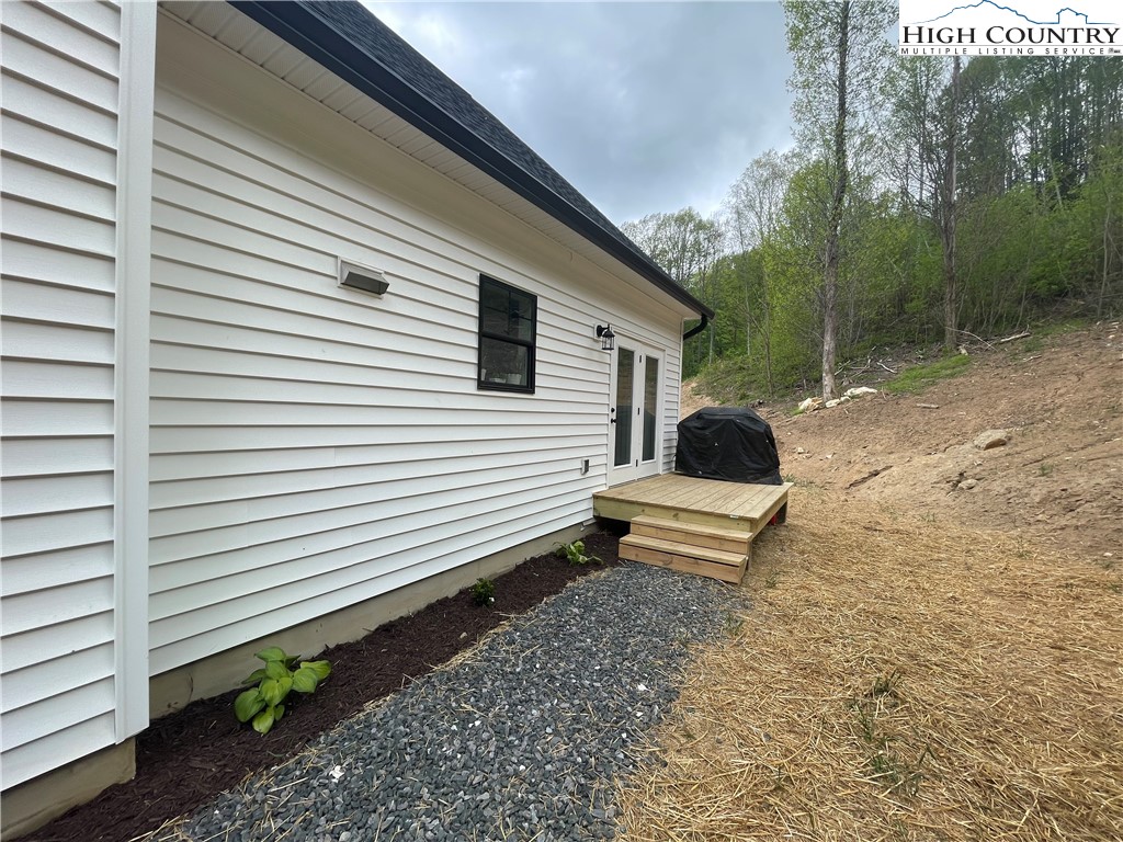 878 Ballou Farm Road Crumpler, NC 28617 - Photo 45 of 45 a front view of a house with a yard