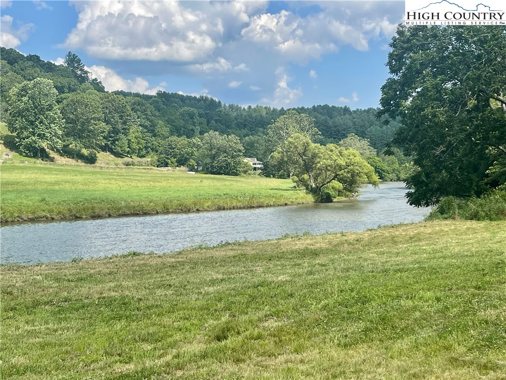 878 Ballou Farm Road Crumpler, NC 28617 - Photo 9 of 45 a view of an outdoor space and a yard