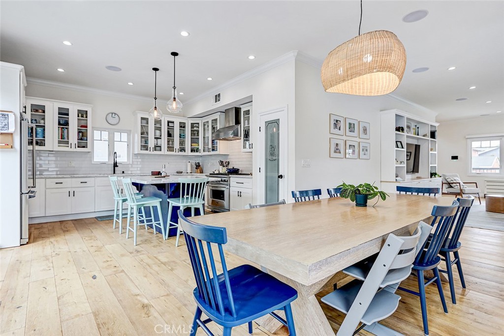 825 Center Street El Segundo, CA 90245 - Photo 11 of 52 a view of a dining room with furniture and wooden floor