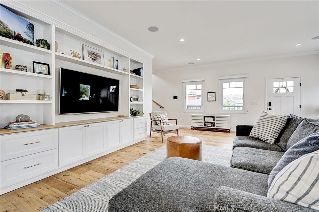 825 Center Street El Segundo, CA 90245 - Photo 16 of 52 a living room with furniture fireplace and flat screen tv