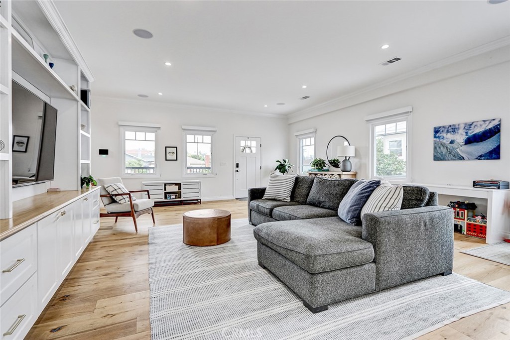 825 Center Street El Segundo, CA 90245 - Photo 18 of 52 a living room with furniture and a wooden floor
