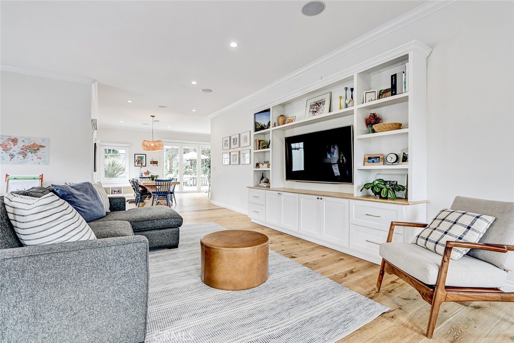 825 Center Street El Segundo, CA 90245 - Photo 19 of 52 a living room with furniture and a flat screen tv
