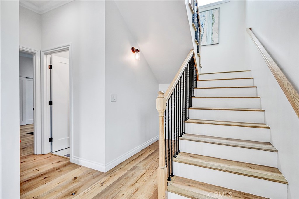 825 Center Street El Segundo, CA 90245 - Photo 20 of 52 a view of entryway and hall with wooden floor