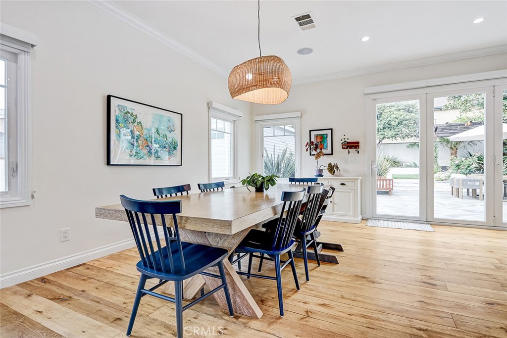 825 Center Street El Segundo, CA 90245 - Photo 7 of 52 a view of a dining room with furniture window and wooden floor