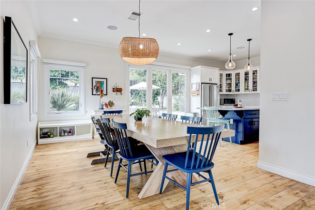 825 Center Street El Segundo, CA 90245 - Photo 9 of 52 a view of a dining room with furniture window and wooden floor