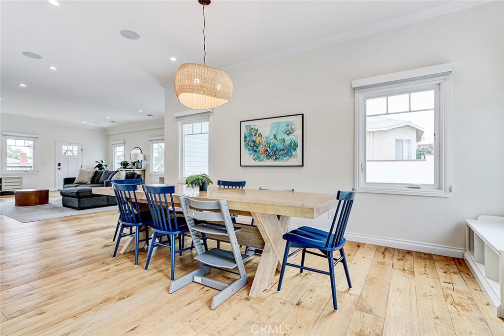 825 Center Street El Segundo, CA 90245 - Photo 10 of 52 a view of a dining room with furniture window and wooden floor