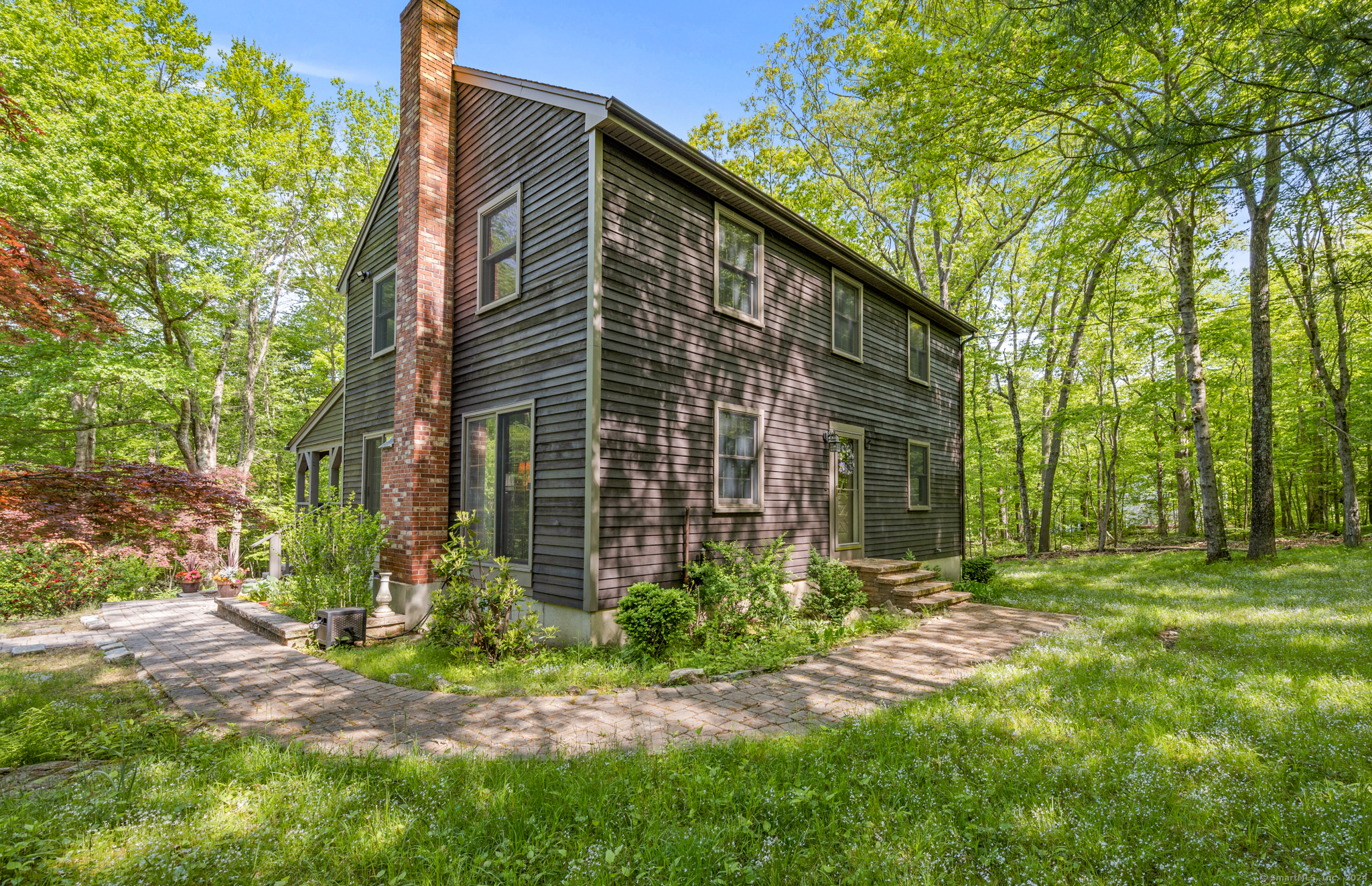 225 Crouch Road Hebron, CT 06231 - Photo 1 of 1 a front view of a house with garden