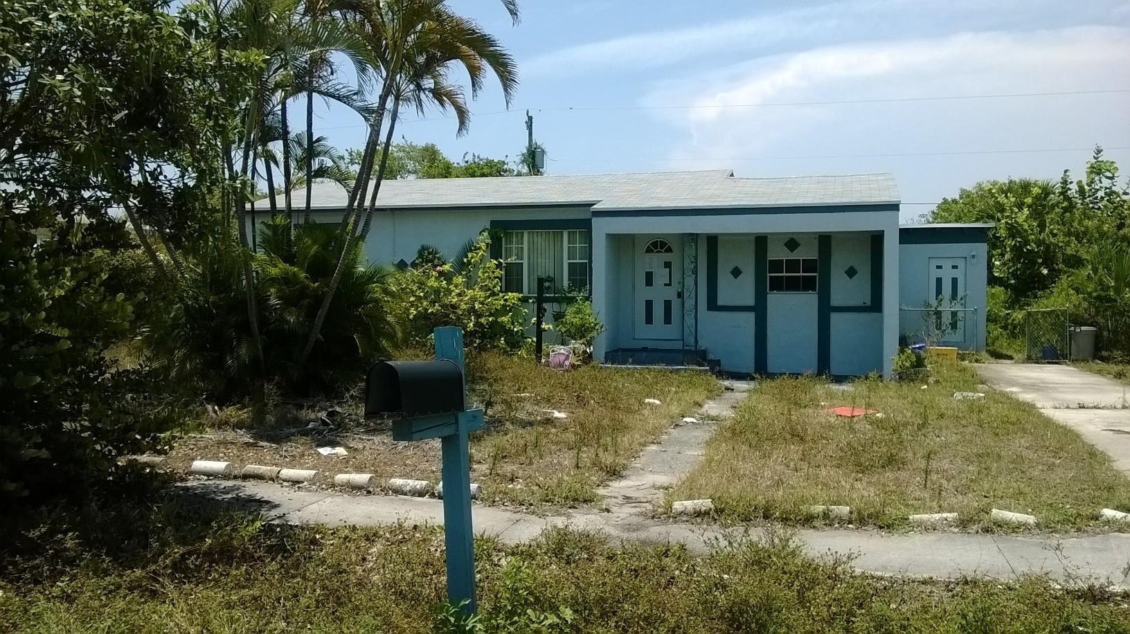 361 West 25th Street Riviera Beach, FL 33404 - Photo 1 of 1 Front