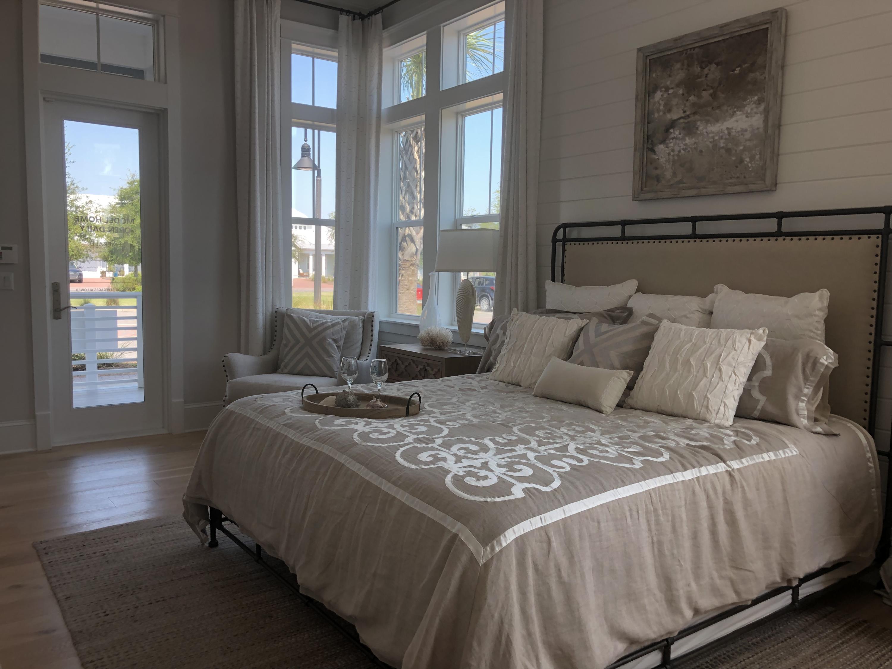 98 Siasconset Ln Inlet Beach Inlet Beach, FL 32461 - Photo 13 of 31 a bedroom with a bed and wooden floor
