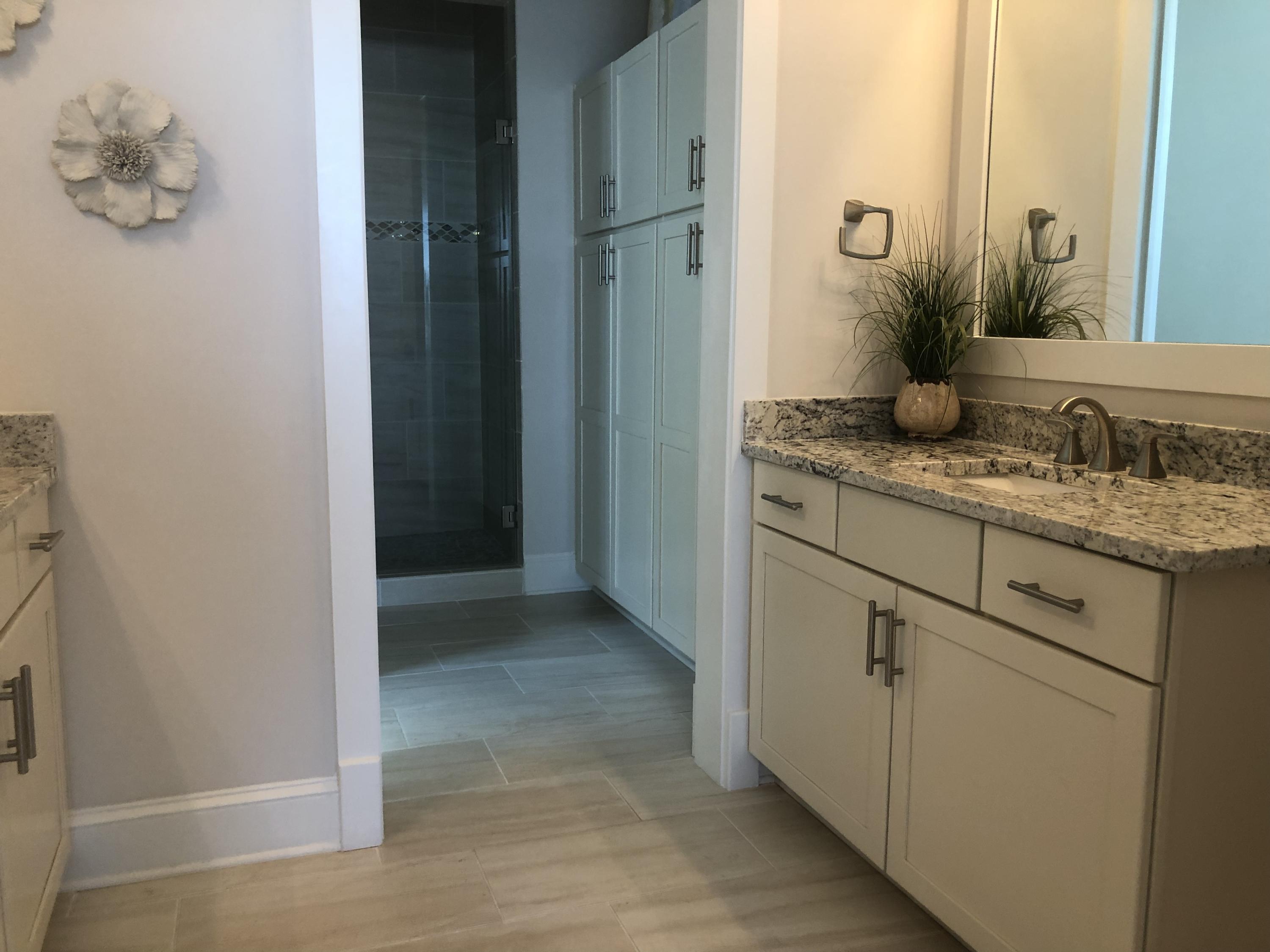98 Siasconset Ln Inlet Beach Inlet Beach, FL 32461 - Photo 18 of 31 a bathroom with a granite countertop sink and a mirror