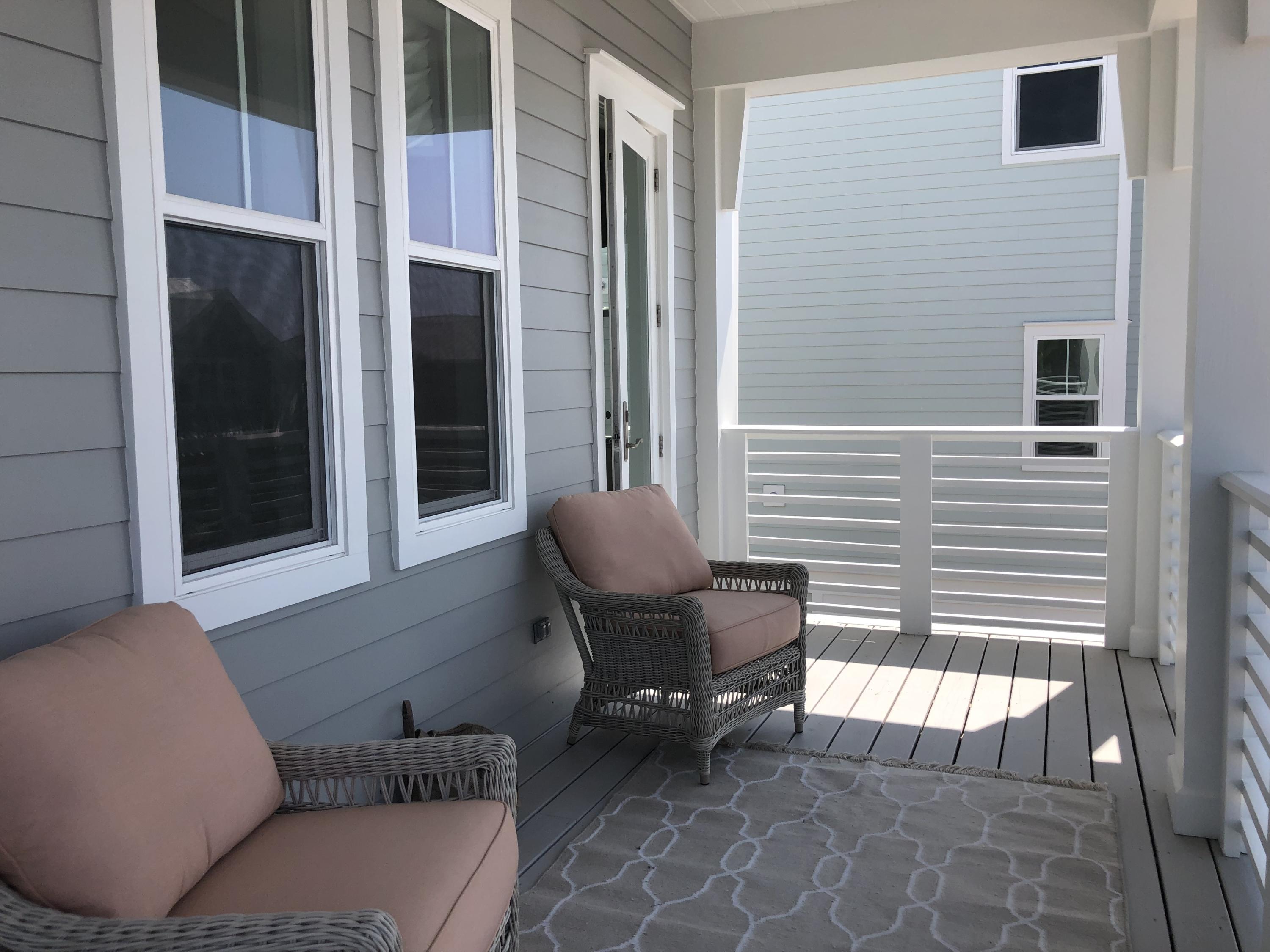 98 Siasconset Ln Inlet Beach Inlet Beach, FL 32461 - Photo 26 of 31 a view of two chairs in the balcony