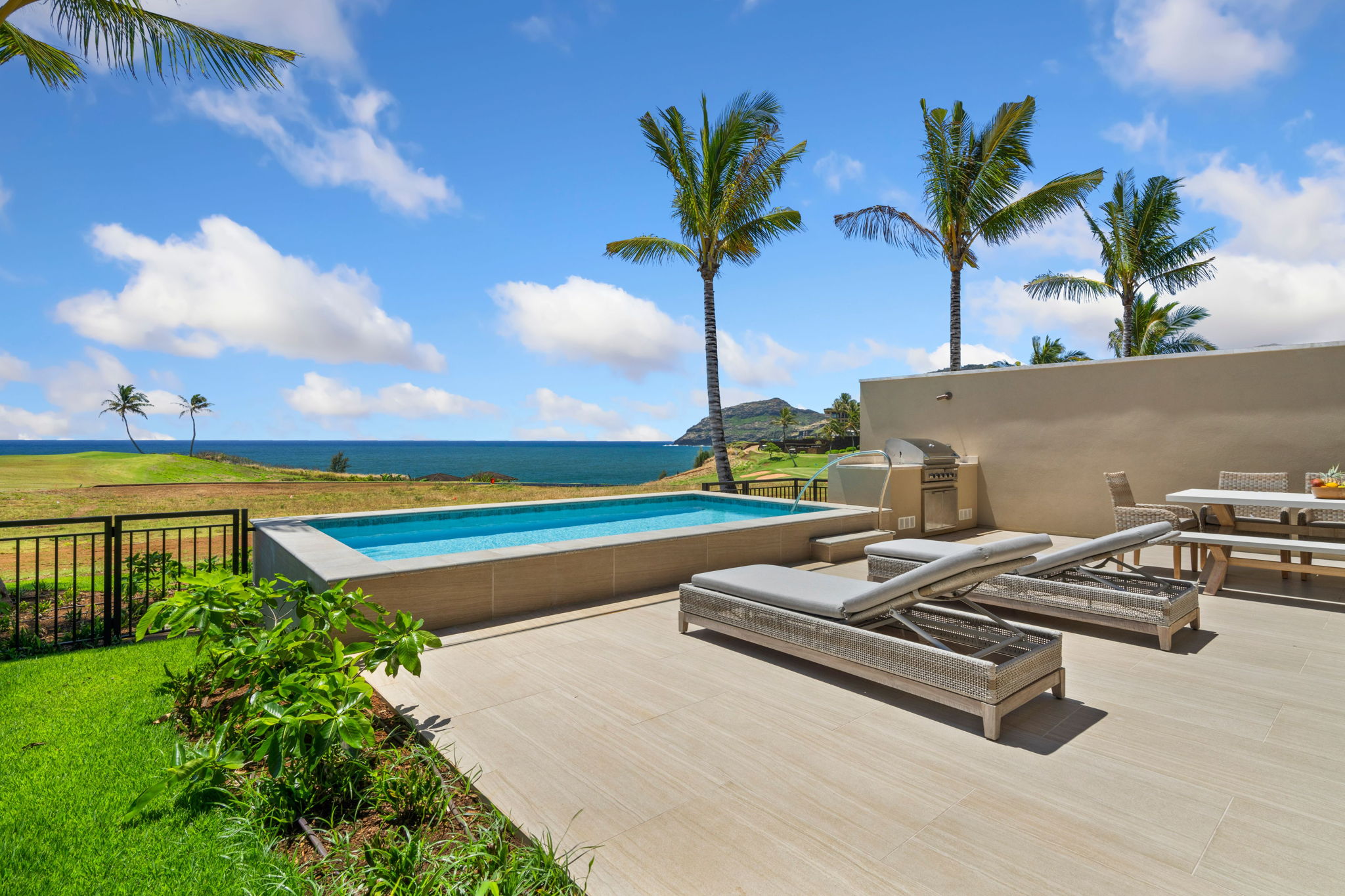 3770 Alaoli Way, Unit 3003 Lihue, HI 96766 - Photo 17 of 30 a view of a terrace with lawn chairs