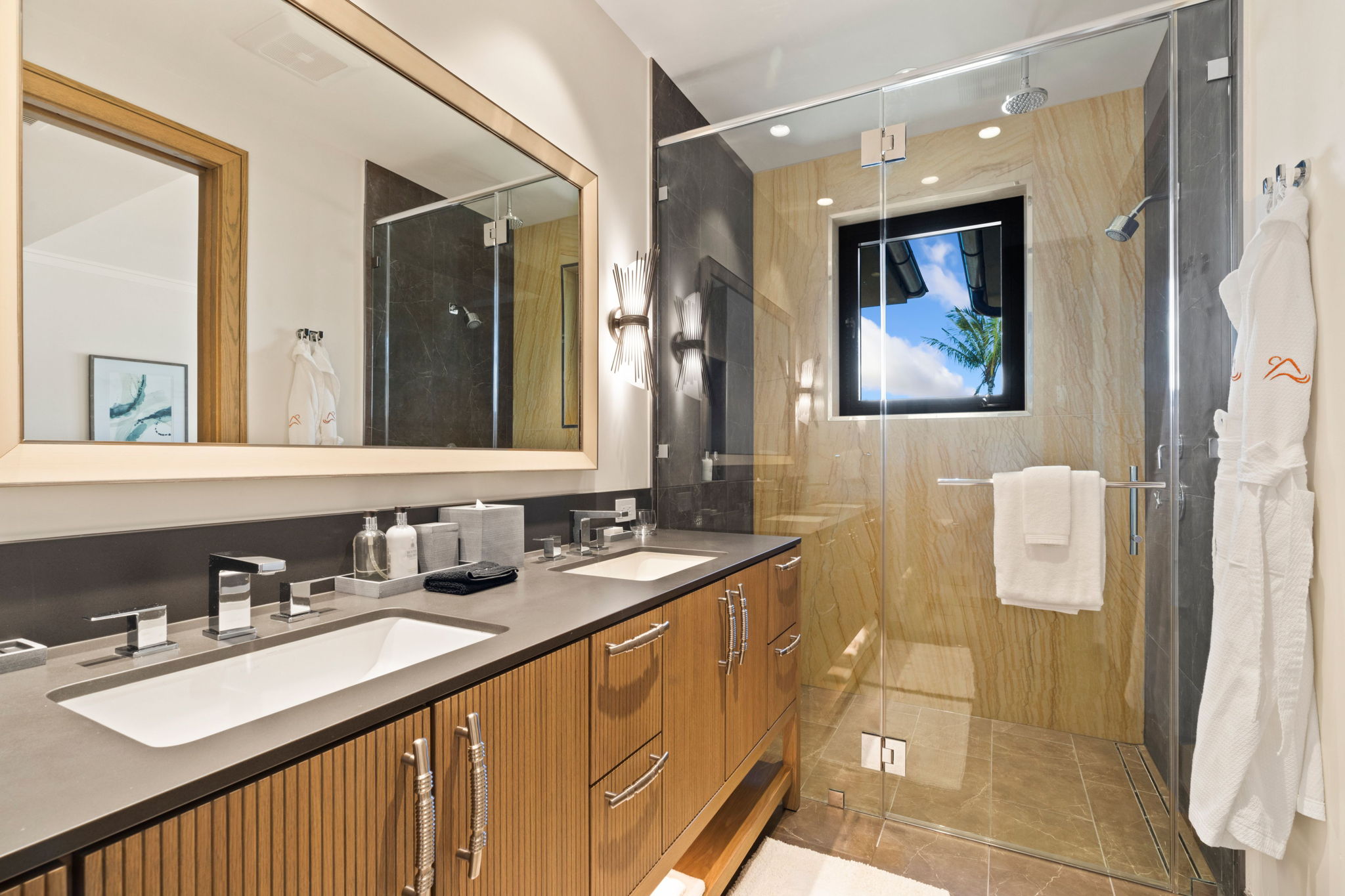 3770 Alaoli Way, Unit 3003 Lihue, HI 96766 - Photo 23 of 30 a bathroom with 2 sink and a mirror