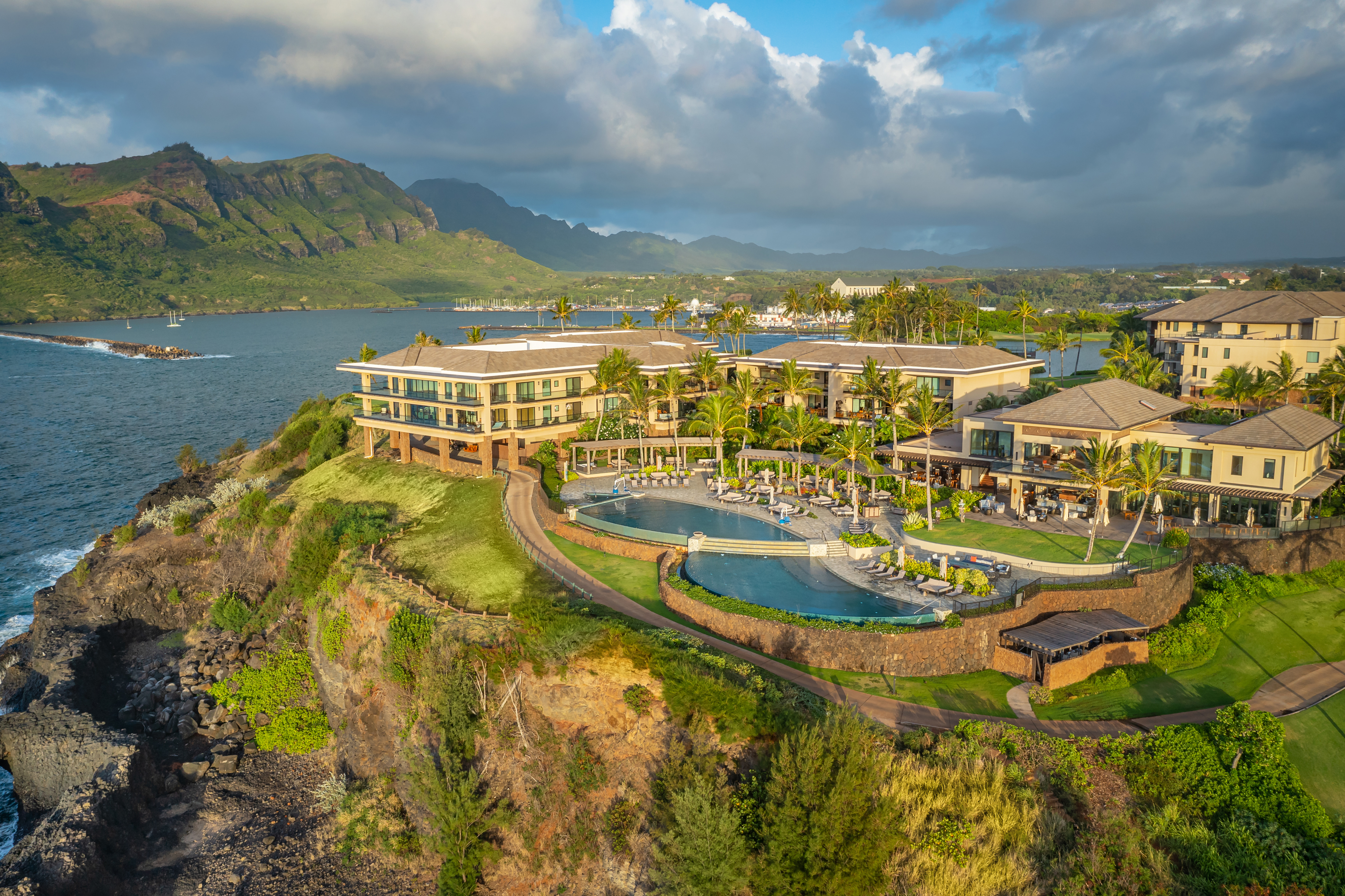 3770 Alaoli Way, Unit 3003 Lihue, HI 96766 - Photo 26 of 30 a view of a swimming pool with an ocean view