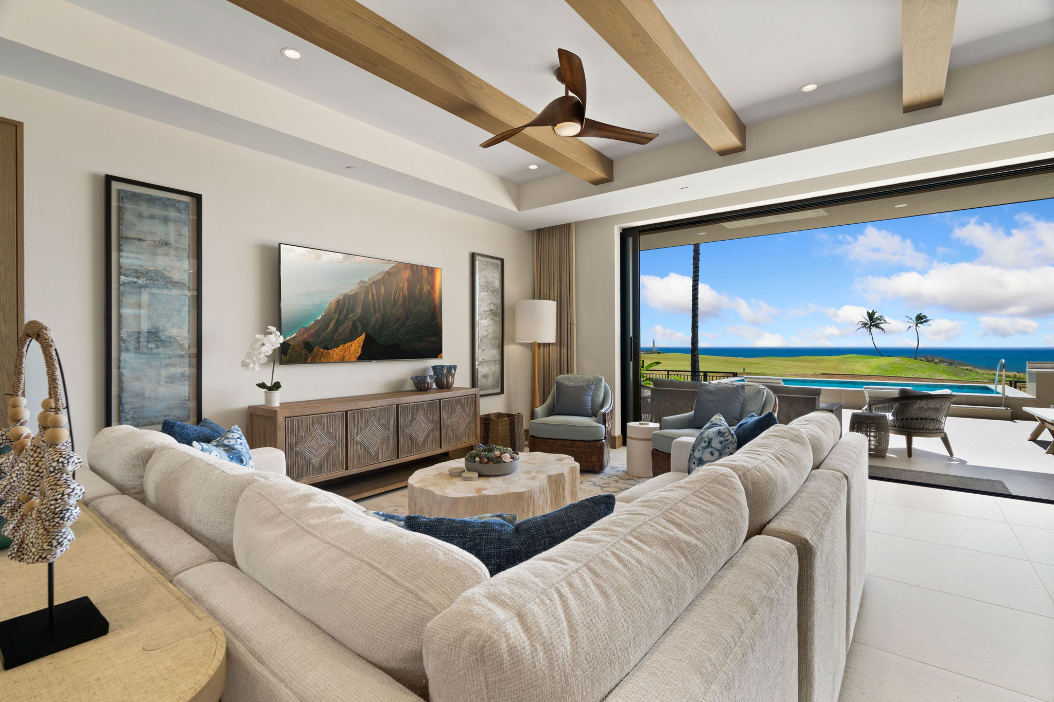 3770 Alaoli Way, Unit 3003 Lihue, HI 96766 - Photo 3 of 30 a living room with furniture and a flat screen tv