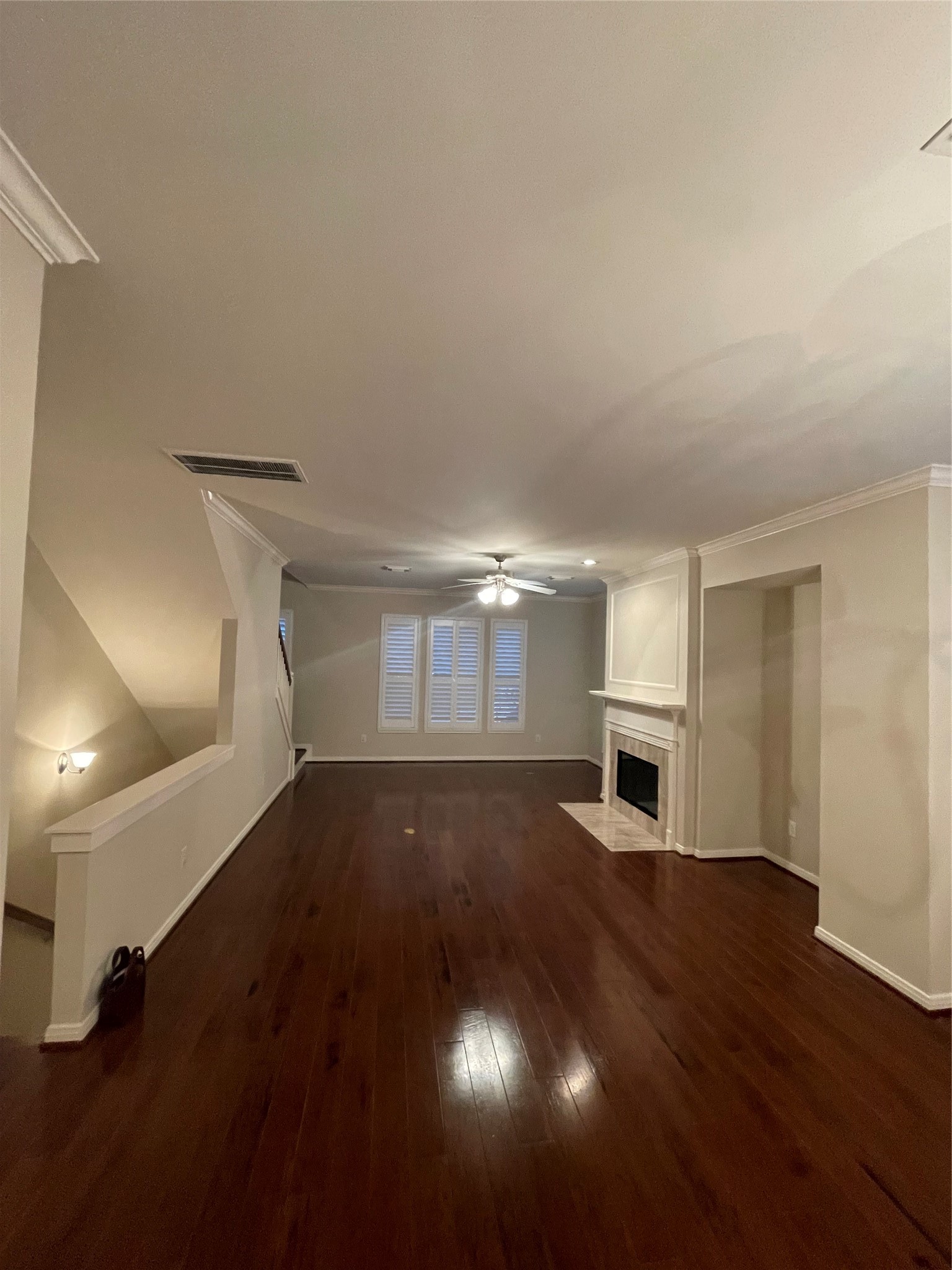 1040 La Rue Street Houston, TX 77019 - Photo 19 of 29 a view of a room with wooden floor and window