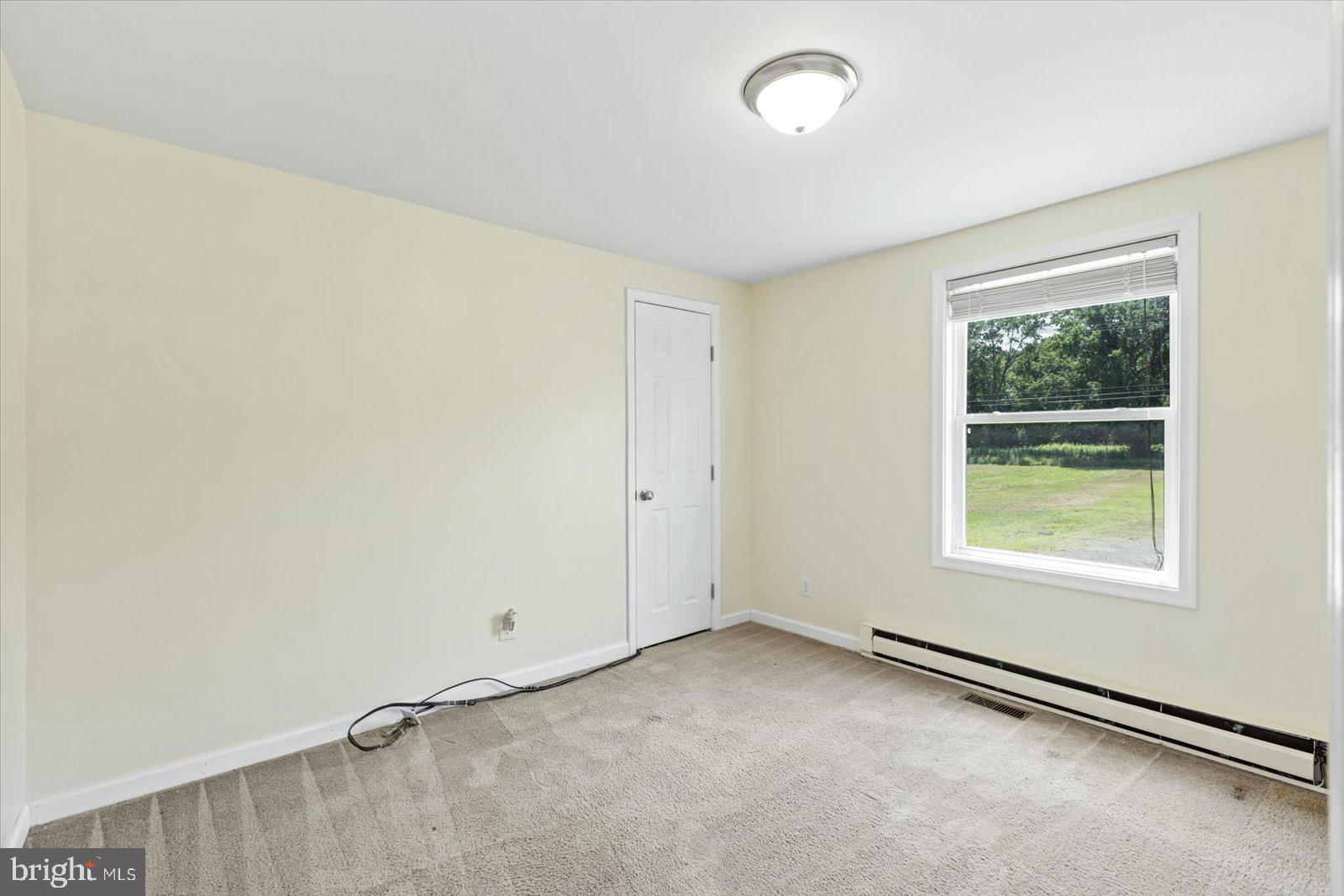 514 Skipjack Road Kinsale, VA 22488 - Photo 16 of 28 Bedroom 2 at the end of the hall.